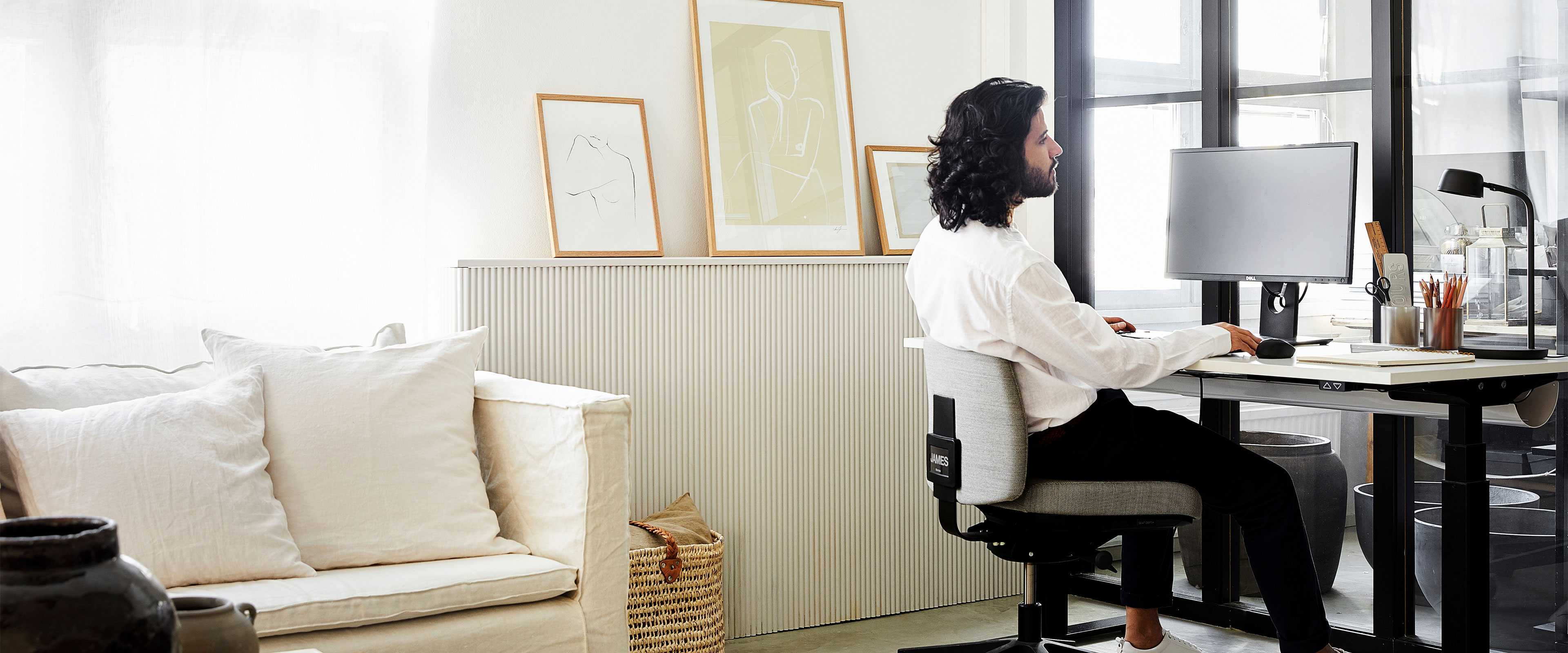 Person at a workstation in a home office